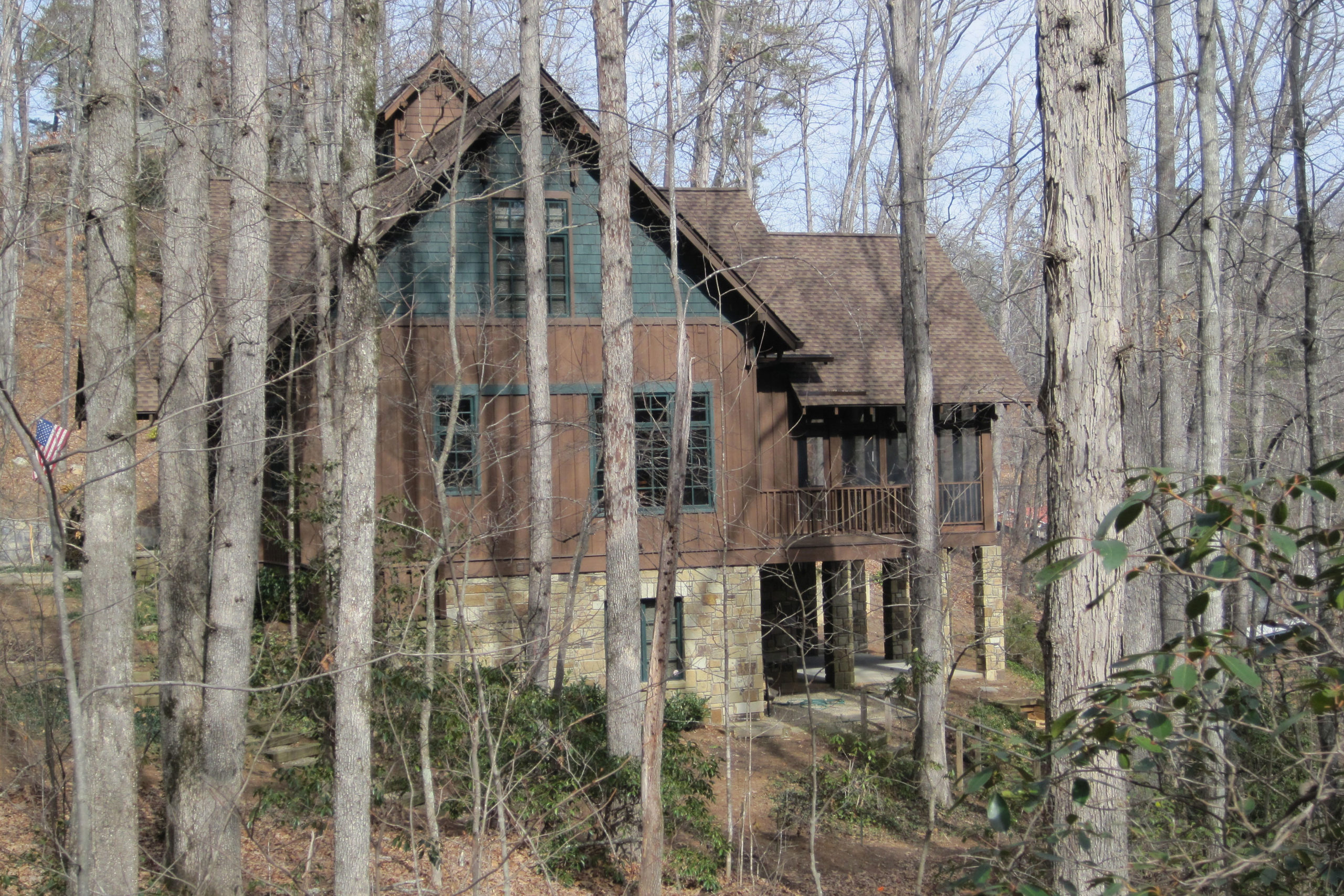 A side view of this private residence illustrating a screen porch facing Lake Lanier.